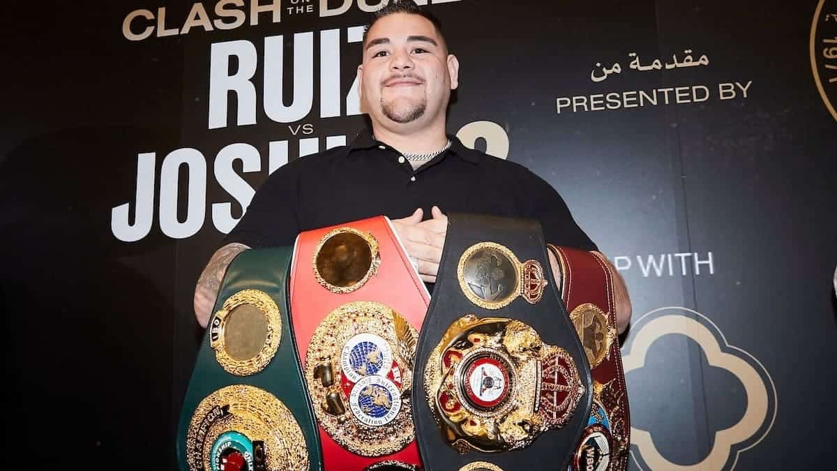 Andy Ruiz Jr with heavyweight title belts