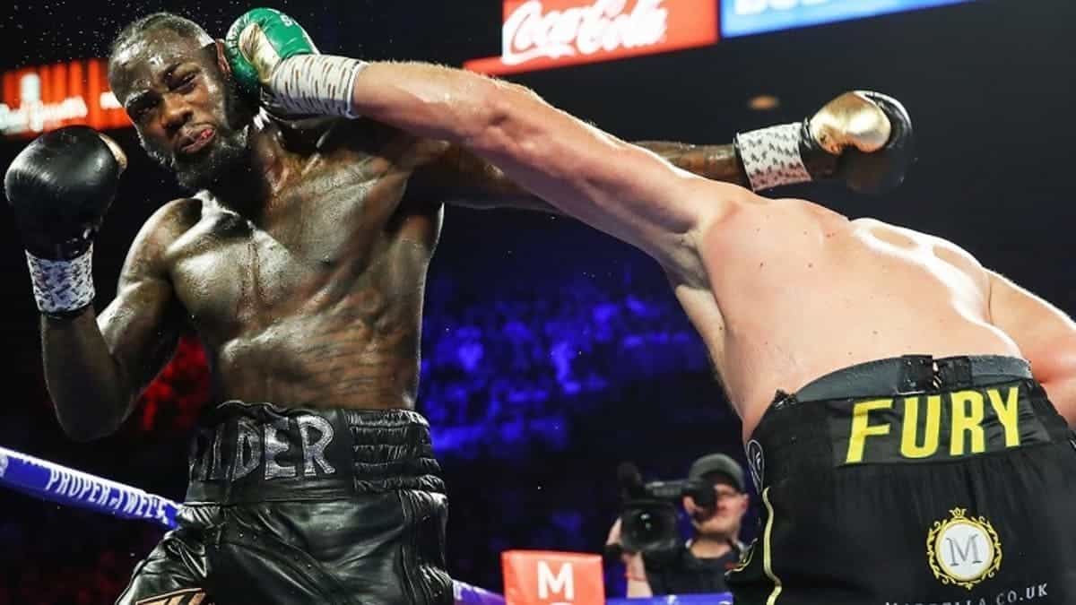 Deontay Wilder hit with Tyson Fury glove